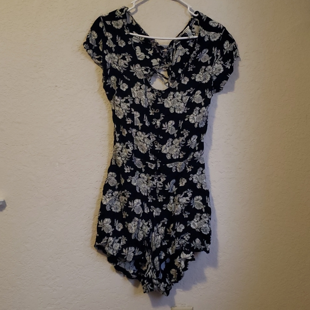 Black, flowery jumper